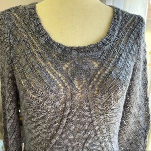 Idk the brand, L, grayish color